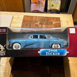 1948 Tucker Diecast Model Car. Never opened collectors car